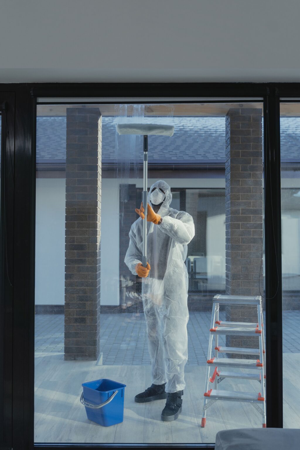 Electrostatic disinfecting of a commercial space